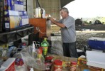 Ed Therrien, 52, the cook for Camp Runamuck, organizes the kitchen area on Thursday, July 30, 2009.