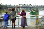 Families welcome crabber F/V Northern Orion as it approaches the Ballard Locks as it returns to Seattle after a crab season in the Bering Sea. © copyright Karen Ducey