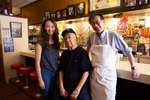 Harry Chan, his brother Tommy Quan and daughter Lisa Chan at the Tai Tung Restaurant in the Chinatown–International District in Seattle, Washington on July 20, 2020. Chan's restaurant was broken into three nights in a row last week. The Chan family has owned the restaurant since 1935.(photo by Karen Ducey)