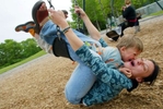 Vera Ranguelova plays on a swingset with her son Yoan, age 3, both from Lake City, WA in Laurelhurst in Seattle on may 9, 2006. (PI photo/Karen Ducey)