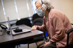 Wong Wai, 94, a resident at the Legacy House, speaks on a ZOOM meeting with her children and grandchildren in Seattle, WA. on May 29, 2020. Originally from mainland China, Wai does not speak English. The Legacy House set up a laptop so residents could communicate with their loved ones. Says Raymond He from International Community Health Center, who runs the assisted living facility, about the family, “They're super grateful. I know they're all very concerned, especially with the news that's been going on right now. It's just a lot of scary news. So just seeing that their parents are here, healthy, safe. It's just really enlightening for them.”