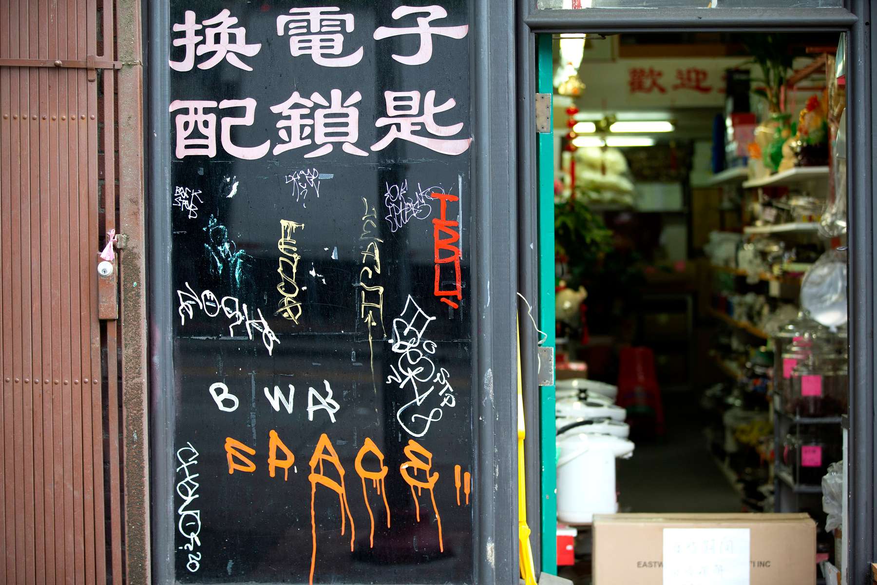 A storefront is damaged in the Chinatown-International District after a night of protests in Seattle, Wash. on May 30, 2020. Protests around the country became violent over the past couple days after the police killing of George Floyd, a black man in Minneapolis, who was killed while in the custody of white police officers. Residents of the Chinatown-International District were already on edge after a couple Asian-targeted hate crimes occurred in the neighborhood fueled by President Donald Trump’s references of COVID-19 as the “Chinese virus” or “Kung flu.”