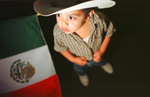 Junior Renteria, one years old, celebrates Mexican Independence Day with his family at St. Patricks Church in Indianapolis, IN. (© copyright Karen Ducey)