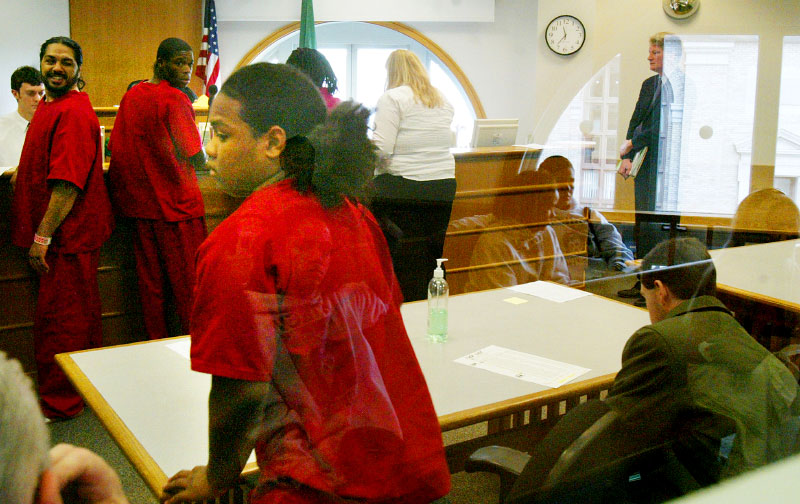Jordan appears in court in Seattle six months after his brother's death. He turned 16 just four days after accidentally shooting his brother, and the state charged him as an adult.  He faces eight years in jail. He was detained in adult prison twice during his year on home detention, this time for going to football practice after school without the knowledge of his social worker.    © Karen Ducey/ Seattle PI