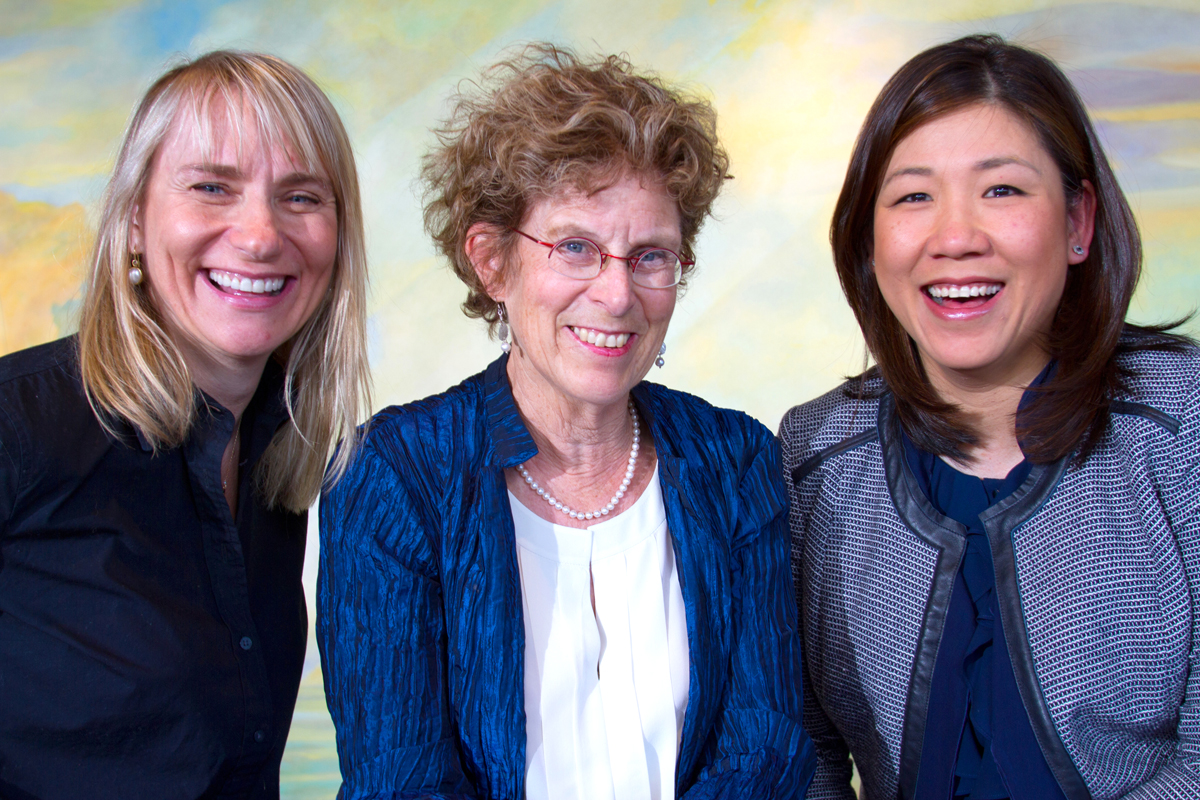 From left to right: Philanthropists Donna Bellew, Judy Pigott, and Jennifer Sik pose for a photo in Seattle. (Photo by Karen Ducey/Puget Sound Business Journal)