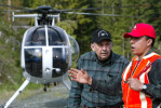Tony Reece of Hi Line Helicopters speak with bolt cutter Jose Acuna prior to a job in the foothills of North Cascades outside of Concrete, Wash. on May 22, 2007.  (© copyright Karen Ducey)