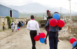 Families leave after graduation ceremonies were held for students of EMPACT NW who were trained in Basic EMT, in Port au Prince, Haiti on September 20, 2011. EMPACT NW is a non-profit based out of Washington state. (photo copyright Karen Ducey) 