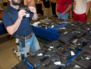 A stall employee checks a second hand gun at a show hosted at the Will rogers Memorial Center in Fort Worth.Dallas is a major city in Texas and is the largest urban center of the fourth most populous metropolitan area in the United States. The city ranks ninth in the U.S. and third in Texas after Houston and San Antonio. The city's prominence arose from its historical importance as a center for the oil and cotton industries, and its position along numerous railroad lines.For two weeks in the summer of 2015, photographer Peter Dench visited Dallas to document the metroplex in his epic reportage, DENCH DOES DALLAS.Photographed using an Olympus E-M5 Mark II©Peter Dench/Getty Images Reportage