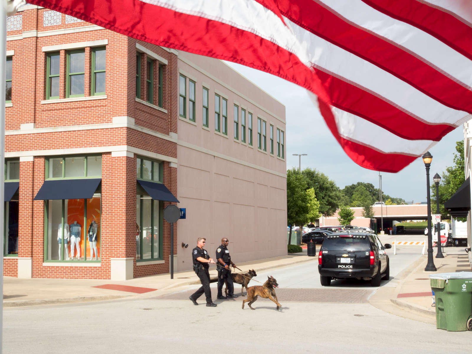 Police officers and dogs from the nearby Dallas Fort Worth airport, search the town of Southlake for explosives ahead of the annual Stars & Stripes celebration. Southlake is an affluent city located north-west of Dallas in the U.S state of Texas with a population of arond 26,5700. Southlake was named in 2014 as one of TIME magazines top 10 richest towns in America a and is known for public schools, Southlake Town Square, its wealth, Gateway Church and Carroll High School's 8-time state champion football team.Dallas is a major city in Texas and is the largest urban center of the fourth most populous metropolitan area in the United States. The city ranks ninth in the U.S. and third in Texas after Houston and San Antonio. The city's prominence arose from its historical importance as a center for the oil and cotton industries, and its position along numerous railroad lines.For two weeks in the summer of 2015, photographer Peter Dench visited Dallas to document the metroplex in his epic reportage, DENCH DOES DALLAS.Photographed using an Olympus E-M5 Mark II©Peter Dench/Getty Images Reportage