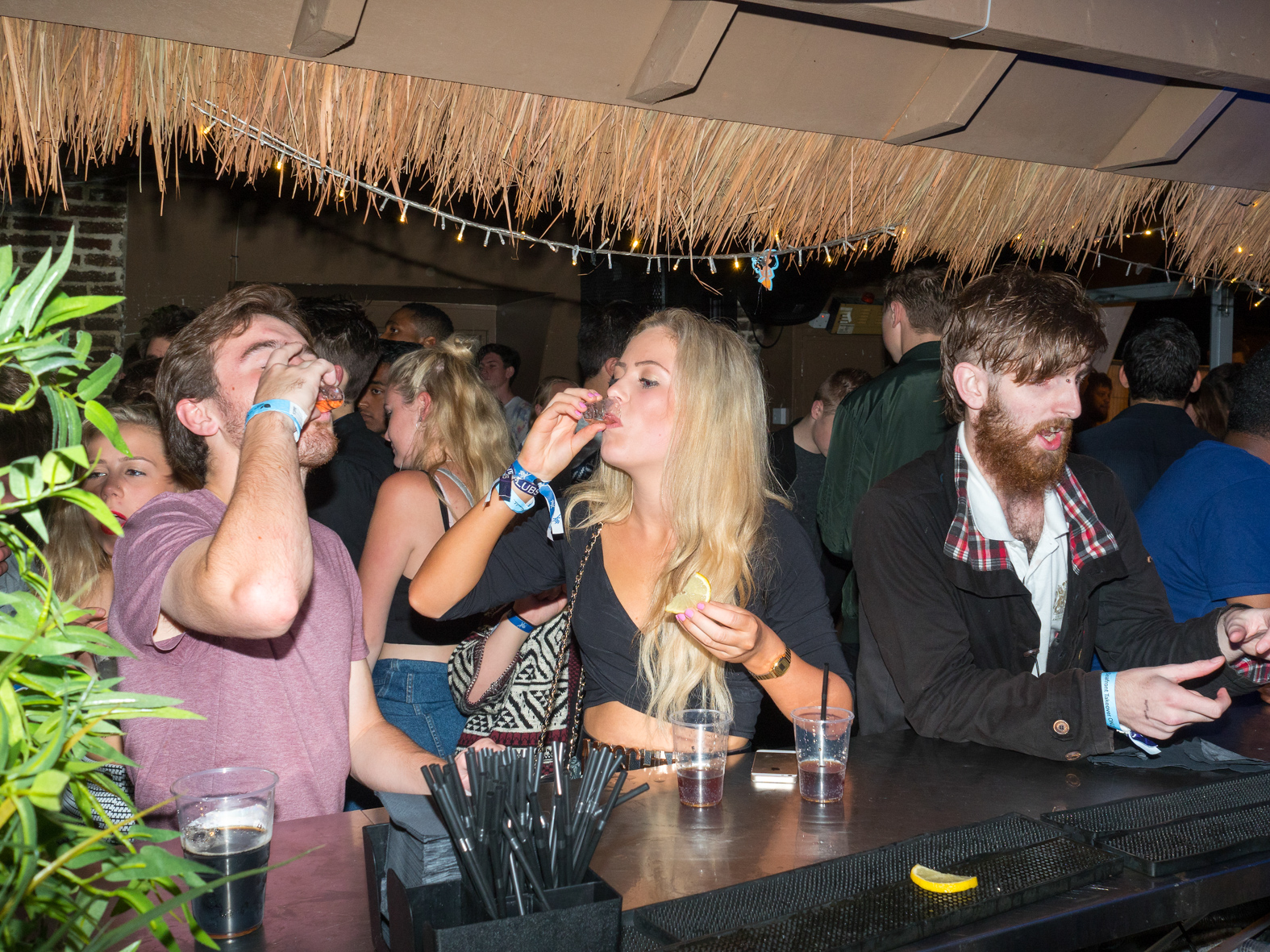 Sussex University students at a Freshers party hosted at Wah Kiki club.The University of Sussex is a public research university situated on a large and open green field site on the South Downs, East Sussex. It is located on the edge of the city of Brighton and Hove. Taking its name from the historic county of Sussex, the university received its Royal Charter in August 1961.Freshers are inducted during Freshers' Week - the first week of the Academic year - ran by the Students' Union of that University, and is usually one of the busiest and most fun weeks of the year. ©Peter Dench/Getty Images Reportage