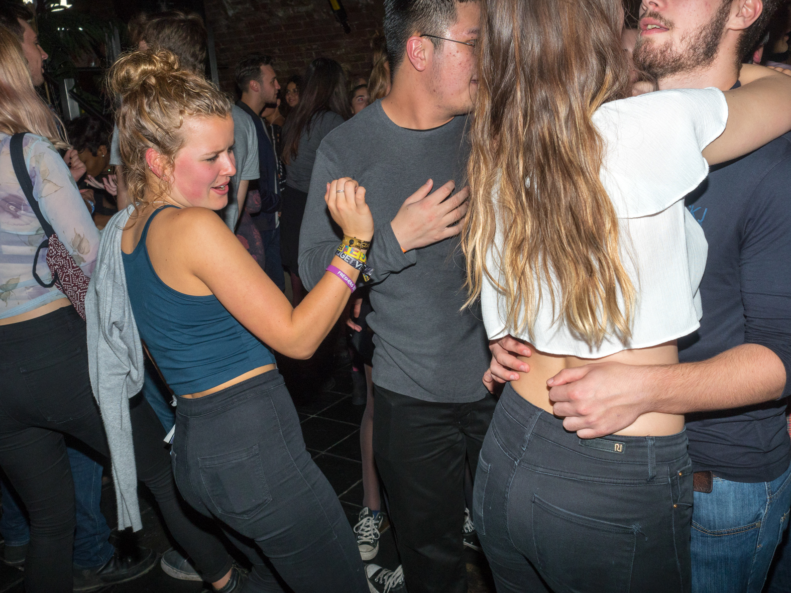 Sussex University students at a Freshers party hosted at Wah Kiki club.The University of Sussex is a public research university situated on a large and open green field site on the South Downs, East Sussex. It is located on the edge of the city of Brighton and Hove. Taking its name from the historic county of Sussex, the university received its Royal Charter in August 1961.Freshers are inducted during Freshers' Week - the first week of the Academic year - ran by the Students' Union of that University, and is usually one of the busiest and most fun weeks of the year. ©Peter Dench/Getty Images Reportage