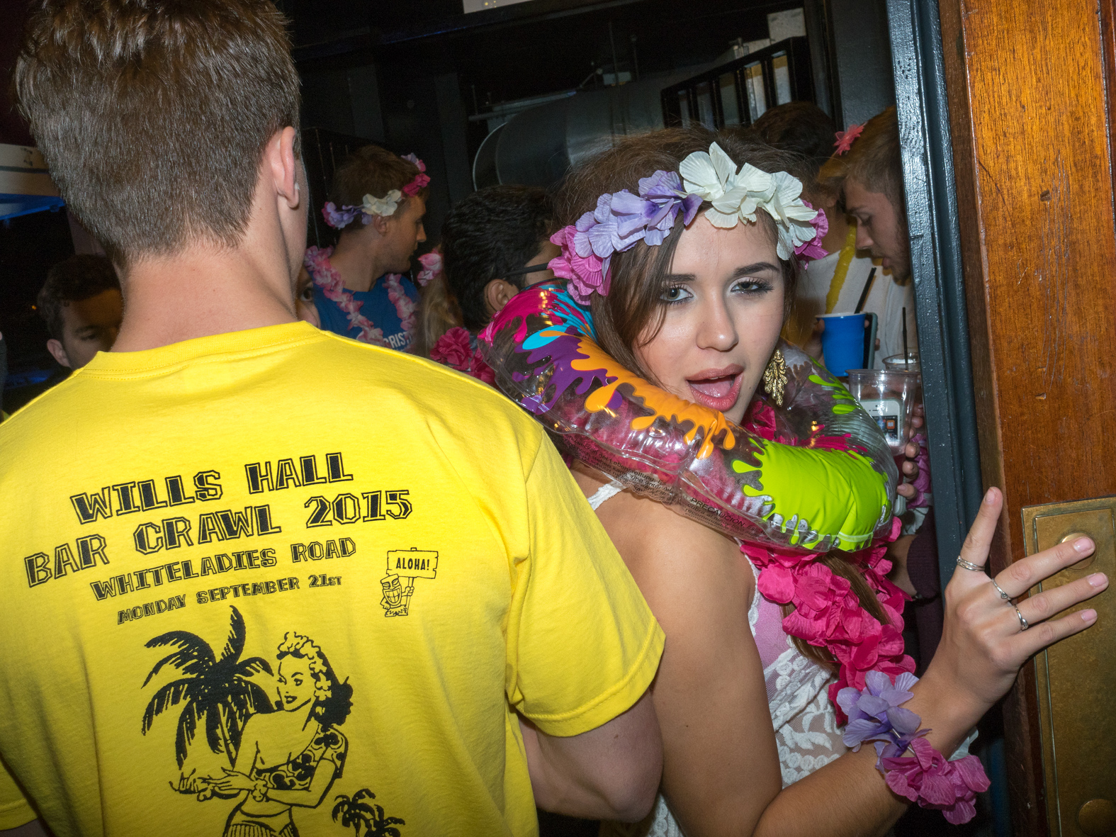 University of Bristol students at a Freshers week, Hawaiian theme boat party hosted at club Thekla.The University of Bristol is a red brick research university located in Bristol, United Kingdom. It received its royal charter in 1909, and its predecessor institution, University College, Bristol, had been in existence since 1876Freshers are inducted during Freshers' Week - the first week of the Academic year - ran by the Students' Union of that University, and is usually one of the busiest and most fun weeks of the year. ©Peter Dench/Getty Images Reportage