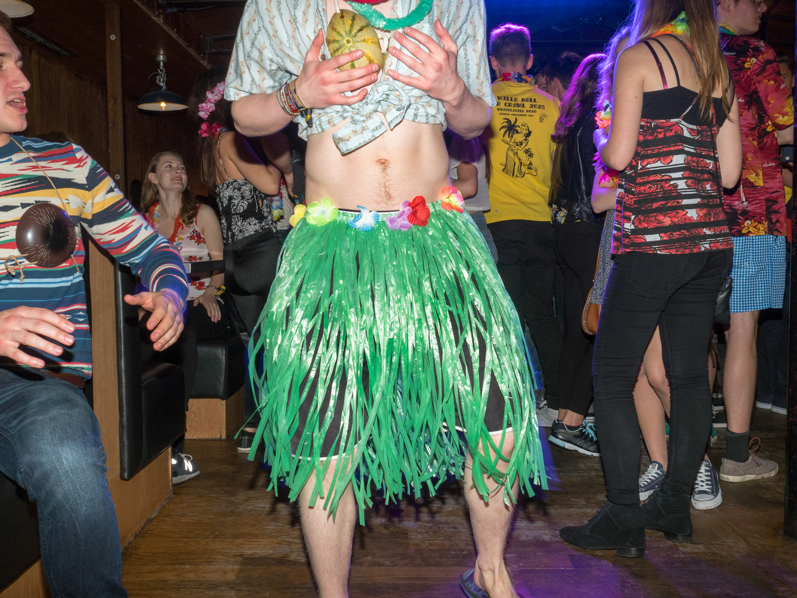 University of Bristol students at a Freshers week, Hawaiian theme boat party hosted at club Thekla.The University of Bristol is a red brick research university located in Bristol, United Kingdom. It received its royal charter in 1909, and its predecessor institution, University College, Bristol, had been in existence since 1876Freshers are inducted during Freshers' Week - the first week of the Academic year - ran by the Students' Union of that University, and is usually one of the busiest and most fun weeks of the year. ©Peter Dench/Getty Images Reportage