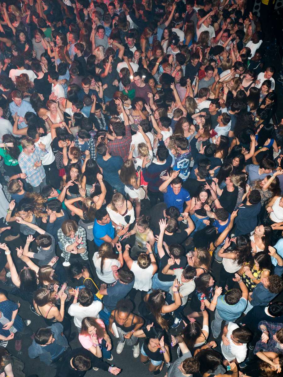 University of Bristol students at a Freshers week party hosted at 02 Academy.The University of Bristol is a red brick research university located in Bristol, United Kingdom. It received its royal charter in 1909, and its predecessor institution, University College, Bristol, had been in existence since 1876Freshers are inducted during Freshers' Week - the first week of the Academic year - ran by the Students' Union of that University, and is usually one of the busiest and most fun weeks of the year. ©Peter Dench/Getty Images Reportage