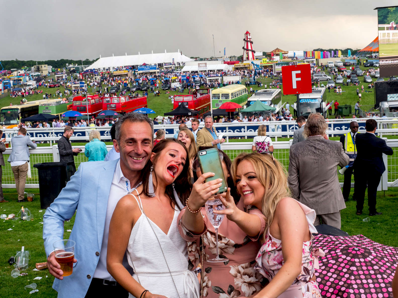 Friends take a selfie on a visit to Epsom.Ladies' Day is traditionally held on the first Friday of June, a multitude of ladies and gents head to Epsom Downs Racecourse to experience a day full of high octane racing, music, glamour and fashion.