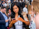 A young female visitor to Epsom shows evidence of using fake tan.Ladies' Day is traditionally held on the first Friday of June, a multitude of ladies and gents head to Epsom Downs Racecourse to experience a day full of high octane racing, music, glamour and fashion.