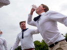 A groupf of German friends play a beer boat drinking game.Henley Royal Regatta is a rowing event held annually on the River Thames by the town of Henley-on-Thames, England. It was established on 26 March 1839.