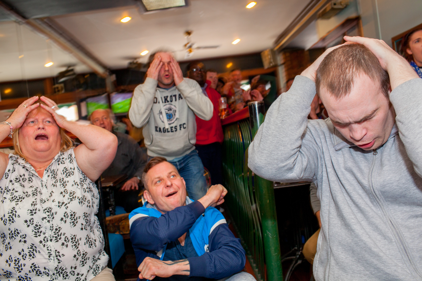 LEICESTER, UK MAY 2016Leicester City football fans watch their team playing away at MAnchester United on the television in the Oasis Bar located on Narborough Road.Narborough Road, one of the main avenues into the city, was named the most diverse street in Britain by researchers. Shopkeepers and small business owners from 23 nations work there.On the 2nd May 2016, Leicester City football club became champions of England for the first time in their 132 year history.Leicester has been dubbed as most multicultural diversified city in England, thanks to scores of people that have flocked the city and who have hailed from different parts of the world. According to the Leicester city council, the city has the highest number of immigrants who have sought both temporary and permanent residence in England. Majority of these immigrants are people who have left their home countries in pursuit of job opportunities in England.  Photo by Peter Dench/Getty Images Assignment for ESPN