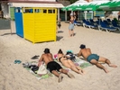 ODESSA, UKRAINE - AUGUST 26: Beach changing booths painted the colours of the Ukranian flag on August 26, 2023 in Odessa, Ukraine. Several beaches in Ukraine's Black Sea city port of Odessa were officially reopened for swimming for the first time since the start of the Russian invasion, bathing remained banned during air raid alerts, an Anti-mine net was placed in between two piers to prevent swimmers encountering shallow-water mines many of which were dislodged by flood waters from the destruction of Kakhovka dam under control of the Russian military. The opening of the beaches has been a welcome respite from the tensions of war. (Photo by Peter Dench/Getty Images)