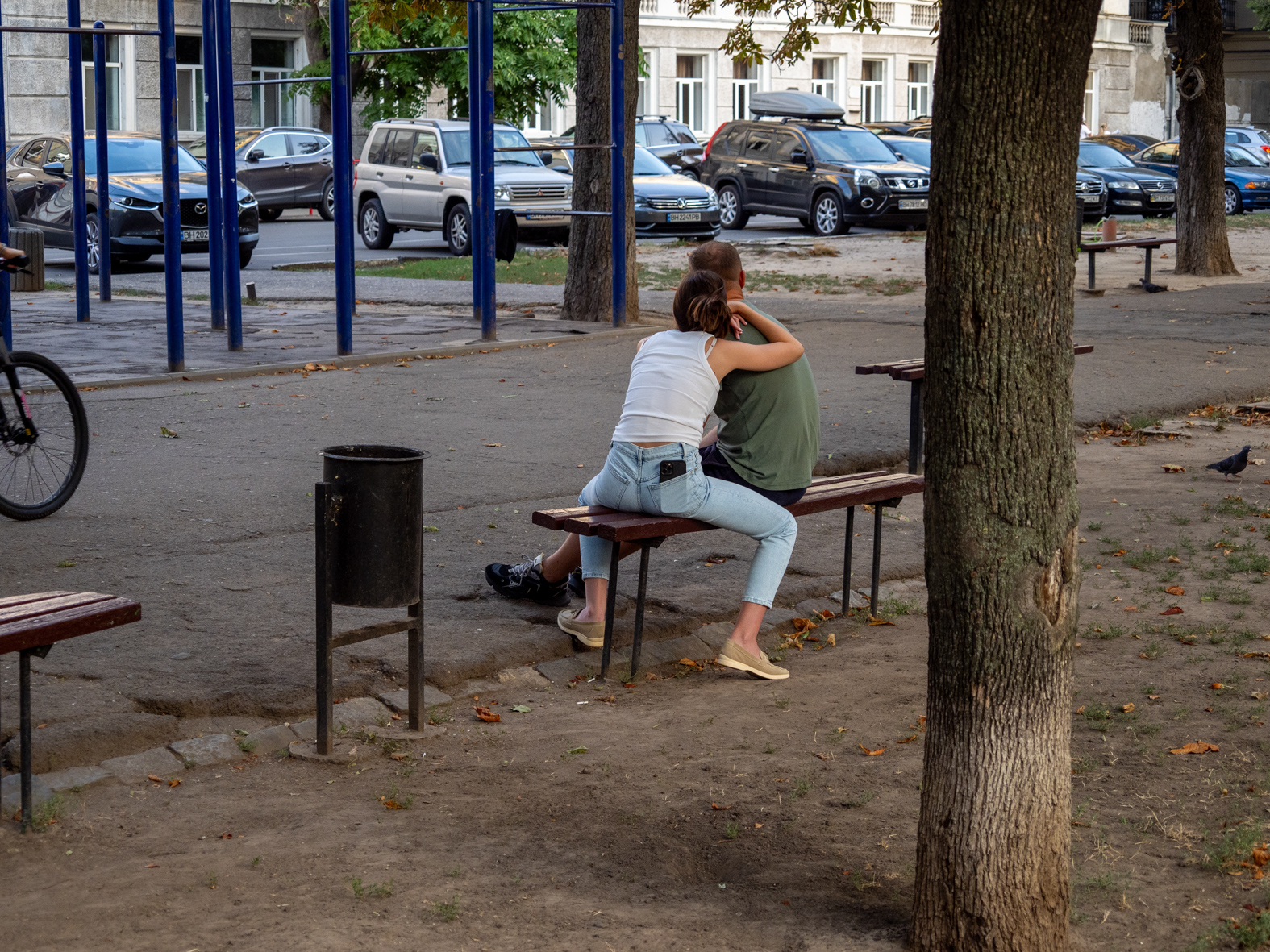 ODESSA, UKRAINE - AUGUST 28: A couple  on an evening out in the city centre on August 28, 2023 in Odessa, Ukraine. (Photo by Peter Dench/Getty Images)
