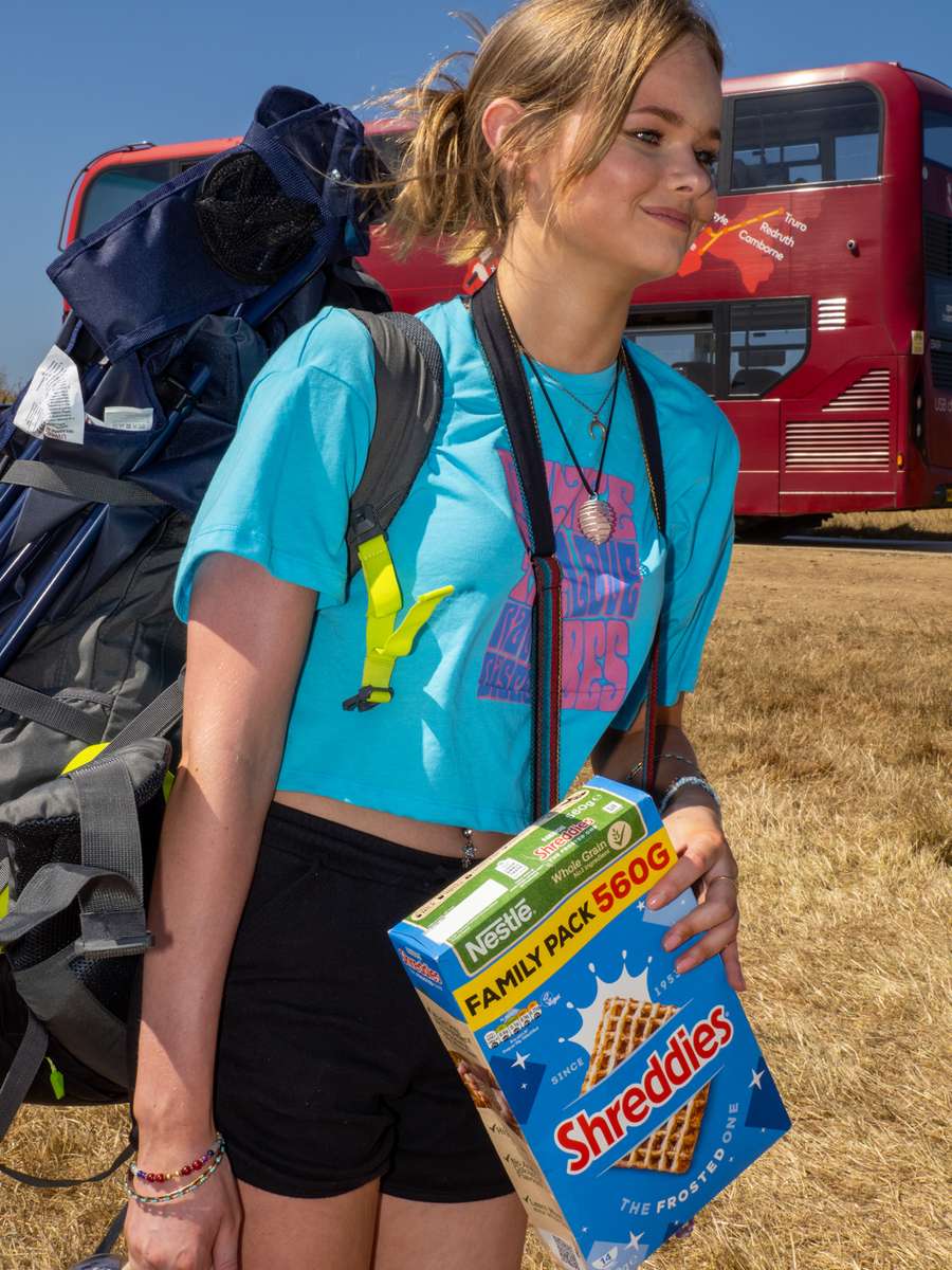 NEWQUAY, ENGLAND - AUGUST, 2022: Shreddies the ceraol choice for one visitor to Boardmasters FEstival. During a heatwave in England, thousands of visitors headed to the town of Newquay, Cornwall for the surfing, beaches and Boardmasters Festival. Resources during the summer are stretched and some local residents are being pushed out of the area by tourists and due to an influx of holiday homes.