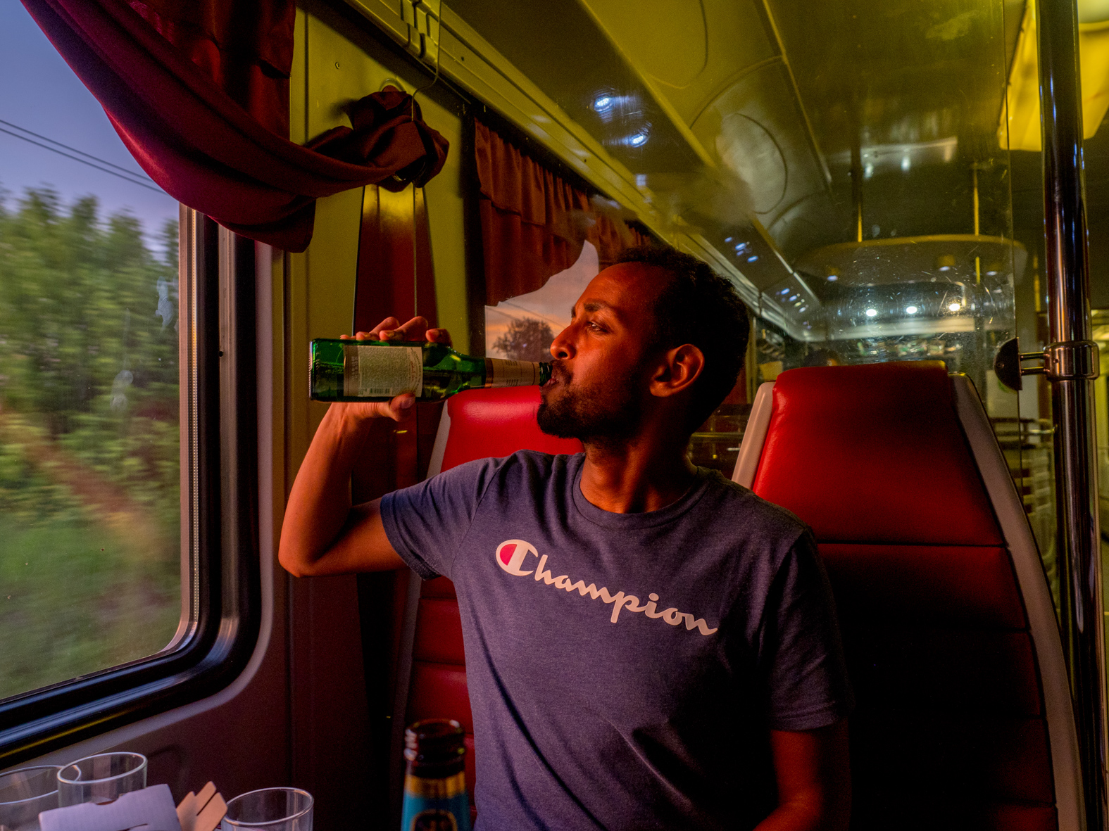 Somalian born, Norwegian national and Arsenal fan, Abdi (aged 27), drinks a beer in the restaurant car on the Trans-Siberian Railway from Moscow-Vladivostok,. Spanning a length of 9,289km, it's the longest uninterrupted single country train journey in the world. It has connected Moscow with Vladivostok since 1916, and is still being expanded. It was built between 1891 and 1916 under the supervision of Russian government ministers personally appointed by Tsar Alexander III and his son, the Tsarevich Nicholas (later Tsar Nicholas II).