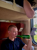 19 year old Toni, a FC Rostov football fan and army recruit working in the bomb disposal unit, drinks a beer in his cabin on the Trans-Siberian Railway from Moscow-Vladivostok. Spanning a length of 9,289km, it's the longest uninterrupted single country train journey in the world. It has connected Moscow with Vladivostok since 1916, and is still being expanded. It was built between 1891 and 1916 under the supervision of Russian government ministers personally appointed by Tsar Alexander III and his son, the Tsarevich Nicholas (later Tsar Nicholas II).