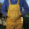 Waterproof oilskins are the essential uniform of any one working on a fishing trawler, but must be removed when inside the boat. The kit is supplied and paid for by each individual fisherman.In 1999, Photojournalist Peter Dench spent five days onboard The Allegiance, a 60 foot UK Scarborough-based trawler, fishing the North Sea, with a crew of five.  The future has since become extremely bleak for the English trawler men; huge areas of the North Sea have been declared \'off limits\' and fishing quotas have been slashed in an attempt to rescue dwindling North Sea stocks from the point of extinction.  These measures have jeopardised the jobs of those in the industry and put dependent towns, like Scarborough, on the brink of ruin.Dench returned to The Allegiance in 2005 to be reunited with the crew and to find out how the decline of the North Sea fishing industry has affected their lives.