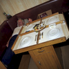 George relaxes in the eating area where the table has raised edges to stop the plates from slipping off. In 1999, George, 65, was the longest serving member of The Allegiance and has worked the trawlers since the age of 15.  Also the ships cook, asked how he coped with cooking in a storm he replied: “You just make the gravy thicker.\{quote}In 1999, Photojournalist Peter Dench spent five days onboard The Allegiance, a 60 foot UK Scarborough-based trawler, fishing the North Sea, with a crew of five.  The future has since become extremely bleak for the English trawler men; huge areas of the North Sea have been declared \'off limits\' and fishing quotas have been slashed in an attempt to rescue dwindling North Sea stocks from the point of extinction.  These measures have jeopardised the jobs of those in the industry and put dependent towns, like Scarborough, on the brink of ruin.Dench returned to The Allegiance in 2005 to be reunited with the crew and to find out how the decline of the North Sea fishing industry has affected their lives.