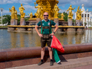 A Mexican football fan wearing traditional German Lederhosen poses for a photograph  by the Friendship of Nations fountain. The 21st FIFA World Cup football tournament took place in Russia in 2018. It was the first World Cup to be held in Eastern Europe and the eleventh time that it has been held in Europe. For the first time the tournament took place on two continents – Europe and Asia. All but two of the stadium venues were in European Russia.