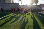 Players of the Gabbiano football club in Rome warm up before a match. Half of the players are schizophrenics. The club performs a startling and successful form of psychiatric therapy. In disaster areas, war zones and urban wastelands, football keeps humanity alive. It brings nations together and promotes unity. It encourages equality and generates pride and self-belief. It has the power to heal and to help, to motivate, to give freedom to dreams and empower a generation. There are millions of people playing the game or helping it to flourish who find that football brings a positive dimension to their lives.Away from the billionaire owned clubs with it's multi-million dollar players, Football's Hidden Story is a series of emotive human interest photographs showing the positive impact football has had at grassroot level on individuals and communities all around the world. 