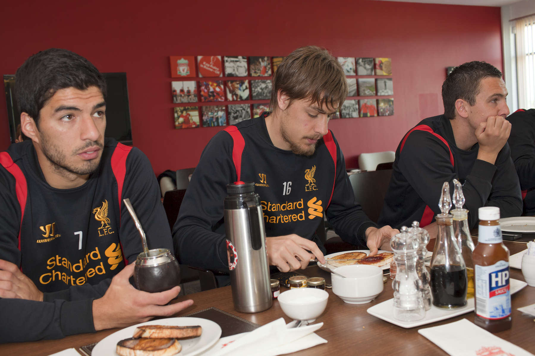 Liverpool FC striker Luis Suarez, Sebastian Coates (and Stuart Downing at breakfast before training at Melwood.Melwood is the Liverpool FC training ground, located in the West Derby area of Liverpool. It is seperate from the Liverpool Academy, which is based in Kirkby.Melwood was redeveloped in the early 2000′s with large input from then-manager Gerard Houllier and now features some of the best facilities in Europe. It has been the club’s training ground since the fifties and was previously transformed into a top class facility by Bill Shankly.Facilities include sythetic pitches, rehabilitation rooms, press and meeting rooms, gymnasium, swimming pool, restaurant and recreational facilities.