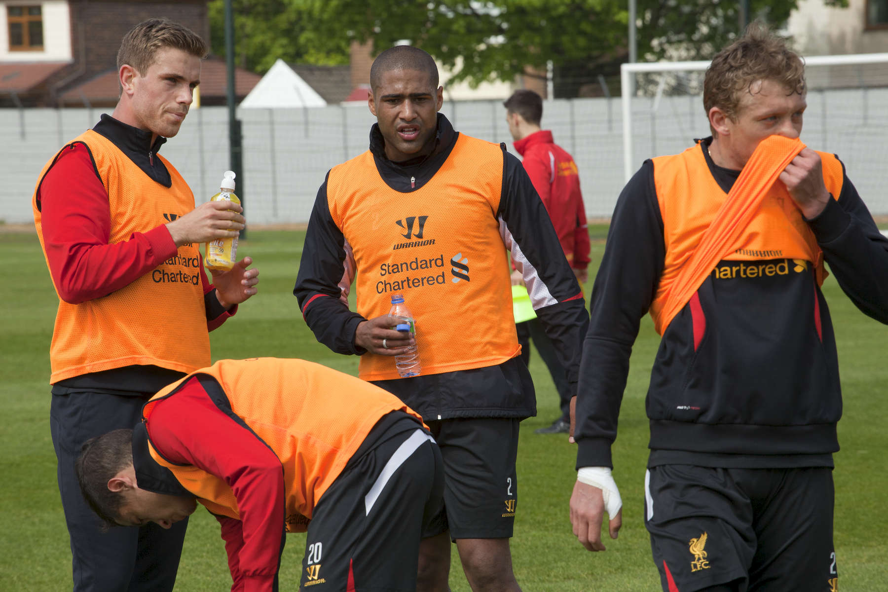 Standing from left: Liverpool FC players after training at Melwood Jordan Henderson, Glen Johnson and Lucas.Melwood is the Liverpool FC training ground, located in the West Derby area of Liverpool. It is seperate from the Liverpool Academy, which is based in Kirkby.Melwood was redeveloped in the early 2000′s with large input from then-manager Gerard Houllier and now features some of the best facilities in Europe. It has been the club’s training ground since the fifties and was previously transformed into a top class facility by Bill Shankly.Facilities include sythetic pitches, rehabilitation rooms, press and meeting rooms, gymnasium, swimming pool, restaurant and recreational facilities.