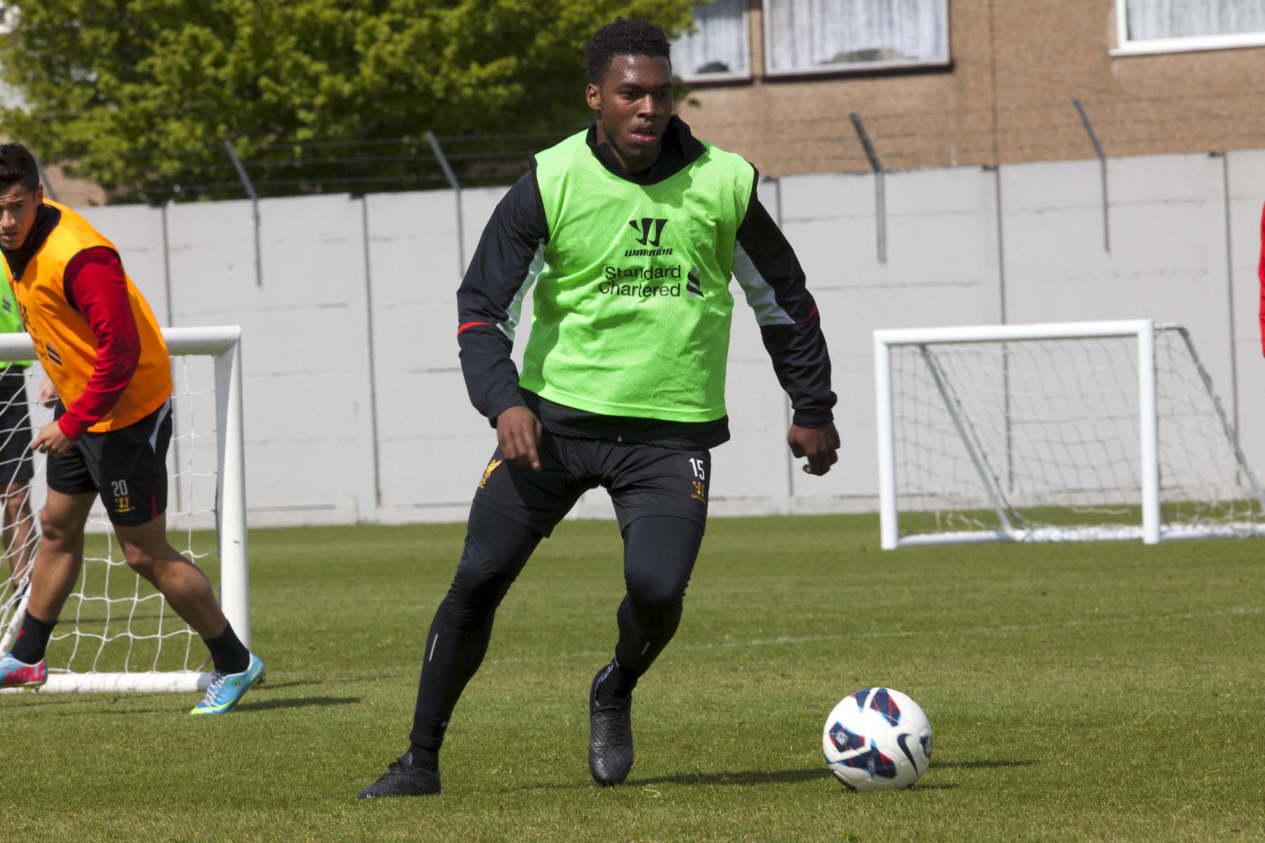 Liverpool FC forward Daniel Sturridge practices his skills at Melwood.Melwood is the Liverpool FC training ground, located in the West Derby area of Liverpool. It is seperate from the Liverpool Academy, which is based in Kirkby.Melwood was redeveloped in the early 2000′s with large input from then-manager Gerard Houllier and now features some of the best facilities in Europe. It has been the club’s training ground since the fifties and was previously transformed into a top class facility by Bill Shankly.Facilities include sythetic pitches, rehabilitation rooms, press and meeting rooms, gymnasium, swimming pool, restaurant and recreational facilities.