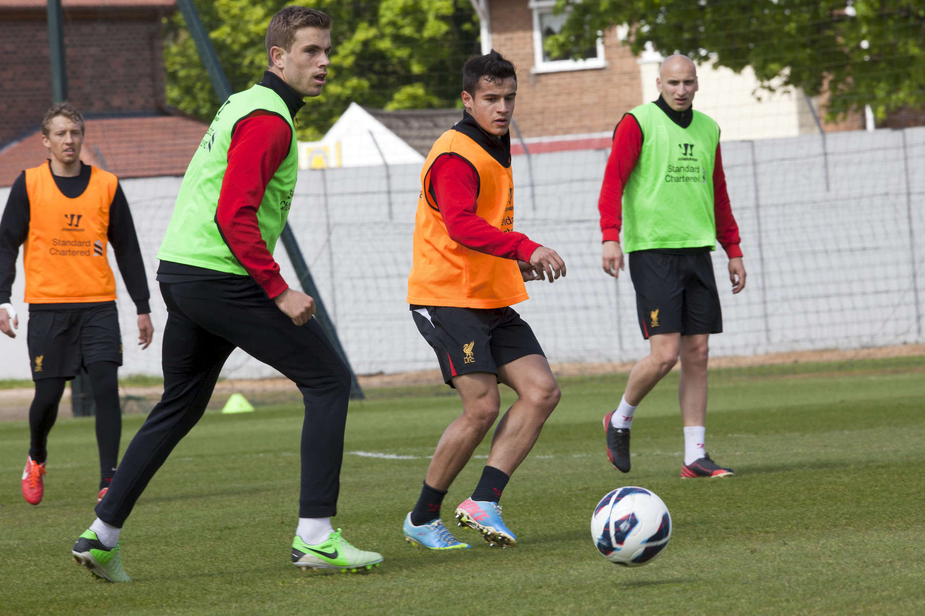 Lucas (far left) Jordan Henderson (second from left) and Jonjo Shelvey (far right) during training at Melwood.Melwood is the Liverpool FC training ground, located in the West Derby area of Liverpool. It is seperate from the Liverpool Academy, which is based in Kirkby.Melwood was redeveloped in the early 2000′s with large input from then-manager Gerard Houllier and now features some of the best facilities in Europe. It has been the club’s training ground since the fifties and was previously transformed into a top class facility by Bill Shankly.Facilities include sythetic pitches, rehabilitation rooms, press and meeting rooms, gymnasium, swimming pool, restaurant and recreational facilities.
