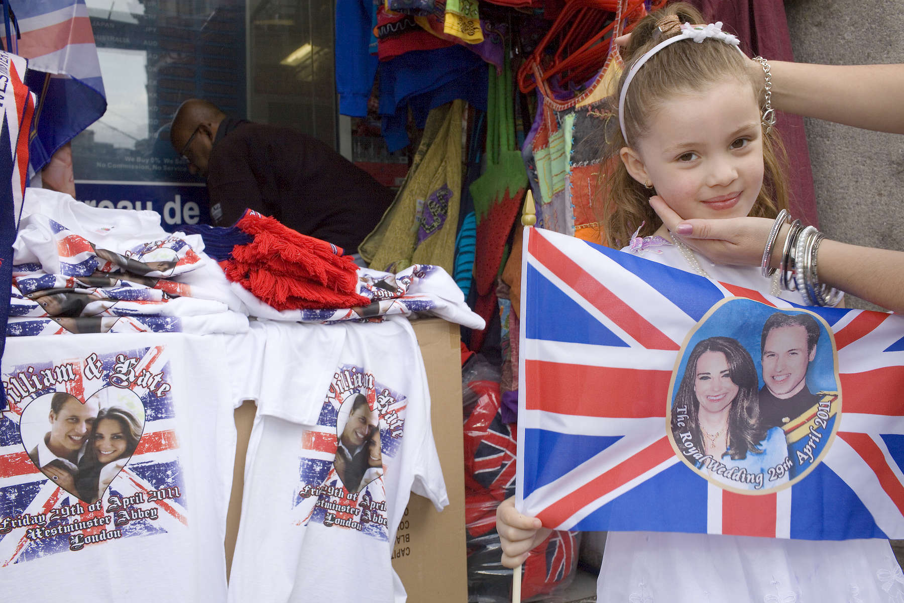 4-year old Rinesa Curri with her union flag of Prince William and Kate Middleton. Rinesa'a family are originally from Kosovo and now live in Camden, North London.