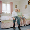 Janet 95 and Robin 85 in Janet's bedroom at Reardon Court, a social services run home for the elderly in North London. Janet has been a widow for over 30 years and Robin has lived alone since 1947. They say falling in love has been an unexpected gift.