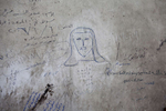 A picture of Jesus Christ drawn on the wall of a home in Moqqatam.Moqqatam is a suburb on the edge of Cairo and home to a people known as the Zabaleen, said to be the world’s greatest waste recyclers. The Zabaleen, which means plainly enough, “the garbage collectors”, pick up around 4,000 tons of Cairo’s waste each day. American researchers have shown that the Zabaleen recycle 85% of this garbage into something useful: a higher rate than anywhere else on the planet. The men do two shifts leaving about 4am and again around 9am. The rubbish is taken back to Moqqatam for the women to sit in and sort through. The organic waste is fed to livestock (the Zabaleen are originally swine herders), the rest sorted for recycling. The future of the Zabaleen is uncertain: if the Cairo authorities get their way, this community of around 25,000 Coptic Christians living in a Muslim country will be gone, and with it, their unique lifestyle.