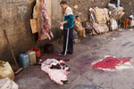 A Zabaleen man skins a slaughtered pig in Moqqatam.Moqqatam is a suburb on the edge of Cairo and home to a people known as the Zabaleen, said to be the world’s greatest waste recyclers. The Zabaleen, which means plainly enough, “the garbage collectors”, pick up around 4,000 tons of Cairo’s waste each day. American researchers have shown that the Zabaleen recycle 85% of this garbage into something useful: a higher rate than anywhere else on the planet. The men do two shifts leaving about 4am and again around 9am. The rubbish is taken back to Moqqatam for the women to sit in and sort through. The organic waste is fed to livestock (the Zabaleen are originally swine herders), the rest sorted for recycling. The future of the Zabaleen is uncertain: if the Cairo authorities get their way, this community of around 25,000 Coptic Christians living in a Muslim country will be gone, and with it, their unique lifestyle.