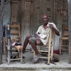 Etienne, 70Works repairing shoes in Marigot where he grew up and has always lived.
