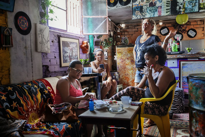 Elena (right) owner of Bar Brex Quebra Galho in Favela Vidigal