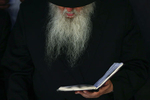 A visitor prays at the gravesite of the Lubavitcher Rebbe, Rabbi Menachem Mendel Schneerson, at the Old Montefiore Cemetery in the Queens borough of New York June 30, 2014. Monday evening and all day Tuesday mark the 20th anniversary of the Rebbe's passing with organizers estimating 50,000 visitors to the site in tribute to the late Jewish leader.  REUTERS/Shannon Stapleton (UNITED STATES )
