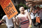 Members of GAPIMNY and Q-Wave groups for queer Asian American New Yorkers march in the Gay Pride Parade. 