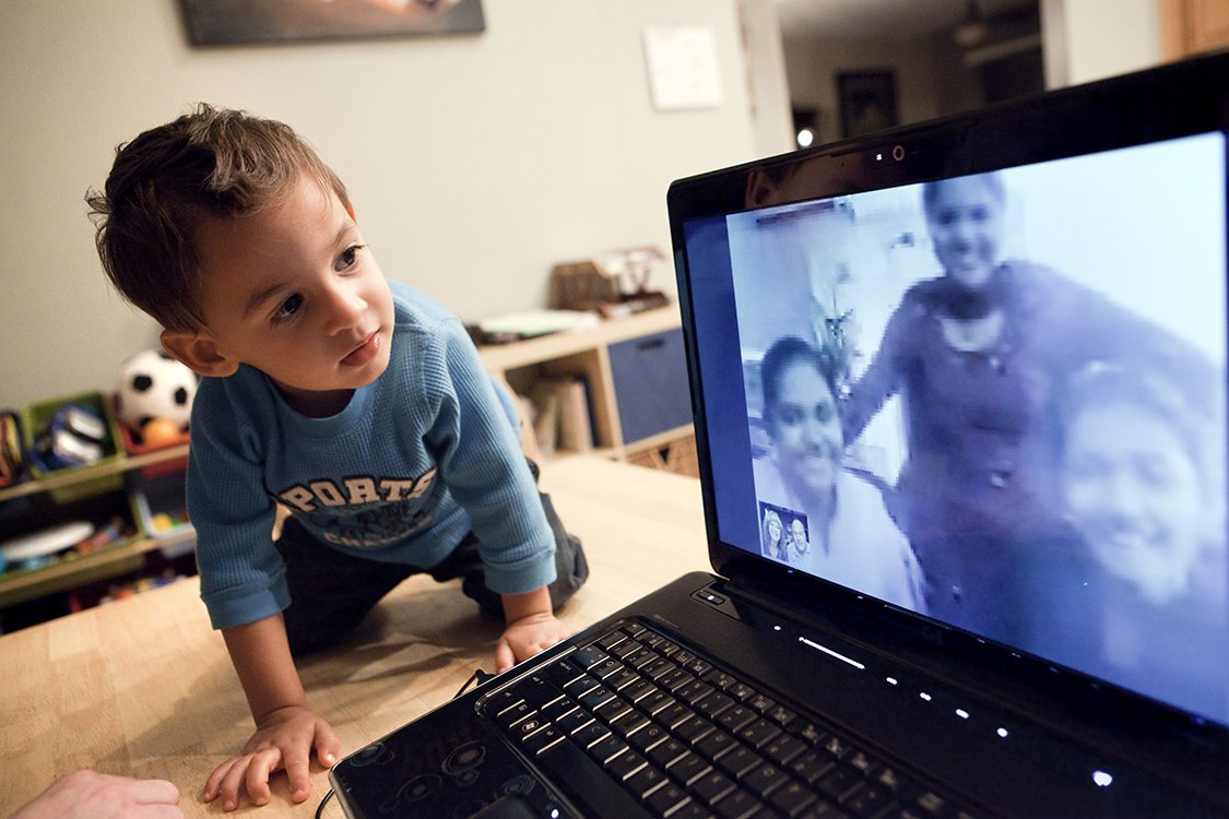 Blaze meets his unborn twin siblings' surrogate (at left) during a skype chat. 