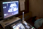 Fatima undergoes a sonogram while she is pregnant with the Wile family's twins.