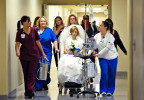 Jessica Wirth is tended to by the St. Mary's Medical Center staff as she makes her way to the chapel for a commitment ceremony to Daniel Lawrence, her partner of seven years, at St. Mary's Medical Center in Evansville on Thursday, January 13, 2011. Wirth had surgery on Wednesday and has advanced gastric cancer. With the help of family, friends and the staff at St. Mary's, the ceremony was put together in under twenty-four hours. Only two days later on Saturday January, 15, 2011, Jessica passed away at 7:35 p.m. surrounded by her family and friends.  The couple has a son, Colton, 18 months.