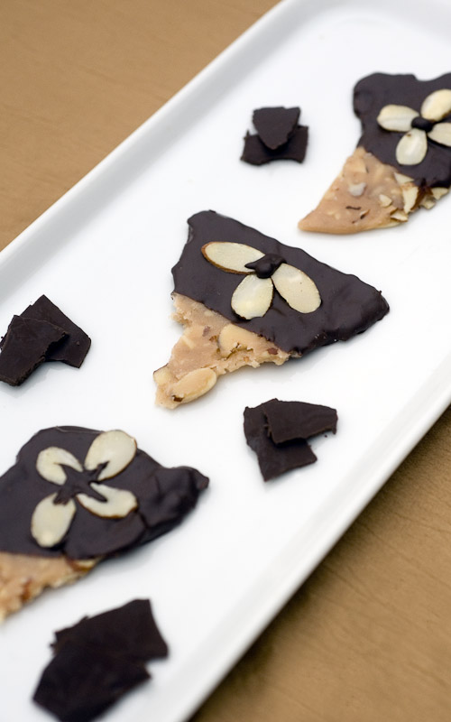 Chocolate covered butter toffee with almonds by Aimee Blume. 