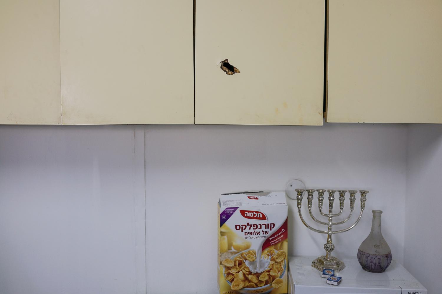 2013.  Hebron.  Palestinian Territories/The West Bank.  A bullet hole from the Second Intifada in the house of an Israeli settler in the middle of Hebron.  