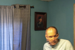 2019. Shelton, Washington. USA.  Chuck Coma in his room at his mother's home.
