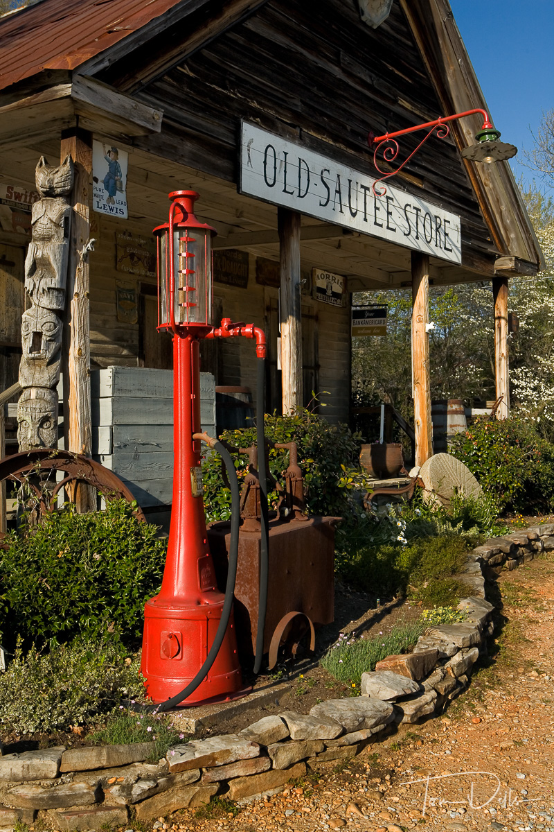 The Old Sautee Store is one of a handful of pre-1900 retail establishments in northeast Georgia. When it was built in 1873 it was a true general store. Local residents would come to the store to purchase food, seed, or farm equipment. It served as a local post office for Sautee-Nachoochee until 1913 and as post office for Sautee until 1962. Through the Nachoochee Valley and directly in front of the store ran the old Unicoi Turnpike, a major thoroughfare from the navigable end of the Tugaloo River to the Unicoi Mountains in Tennessee. Unicoi State Park, which is located near the highway north of Helen, Georgia, takes its name from the road.A second major road connected the Nachoochee Valley with Rabun County. Appearing on maps as early as 1837, portions of this highway are now part of Georgia Highways 197 and 255, and U. S. Highway 76. It used the Stovall Covered Bridge over Chickamauga Creek (for the Civil War buffs, there are two Chickamauga Creeks in Georgia). At the time the store was complete it sat at what was the biggest intersection of roads in these parts.Over the years customers came and went. Loss of the mail contract in 1962 meant hard times for the owners, who sold the store in the early 1970's. Astrid Fried, a native of Norway purchased the store in 1974 and began to sell various items from her country in the store while preserving the post office area as a museum of sorts.Deep, rich, golden brown hues of aged wood are everywhere in this beautiful store. In the front many one-of-a-kind items are on display. Towards the back many just as unique gifts and food are for sale. When we visited a plate of cheese and crackers welcomed us into the store section. By the time we left we had purchase not only some of the cheese and crackers, but a few knick-knacks as Christmas gifts for a couple of hard-to-buy-for friends.Sautee Store -- its well worth the visit.
